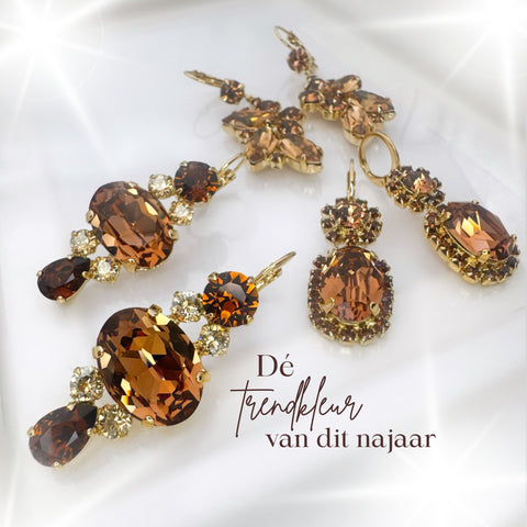 Earrings with golden and olive-green Swarovski stones