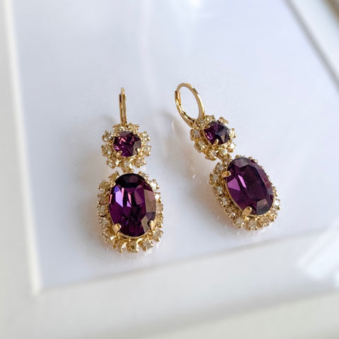 Earrings with shiny purple crystals