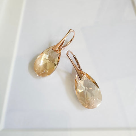 Rose gold earrings with gold crystal drops