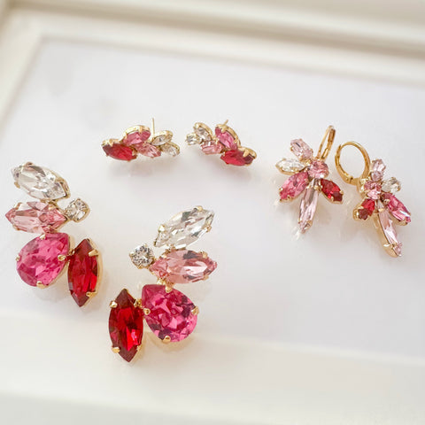 Oorbellen met roze en rode kristallen in bladvorm