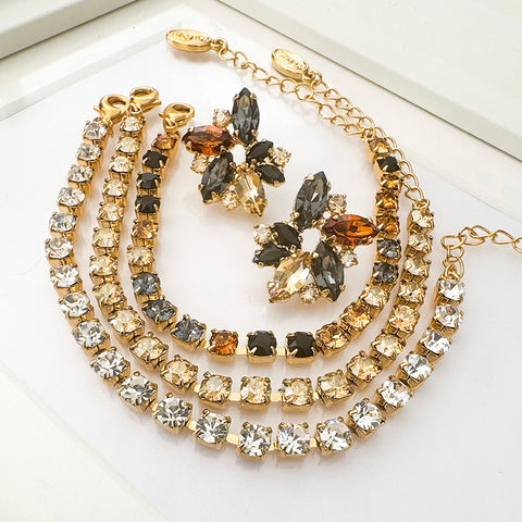 Gouden armbandje (smal) met leopard kristalletjes