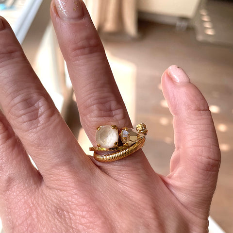 beige ring hand