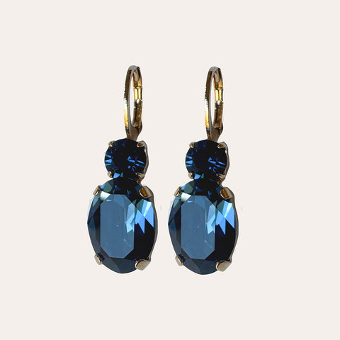 Earrings with dark blue round and oval crystals