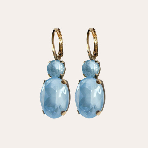 Earrings with light blue round and oval crystals