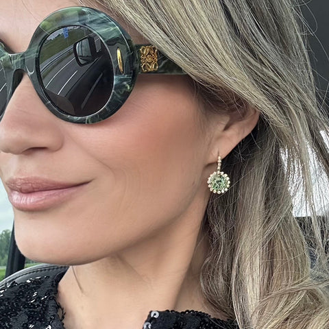 Earrings with light green crystals