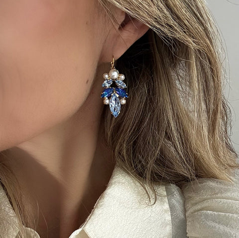 Green earrings with shiny crystals