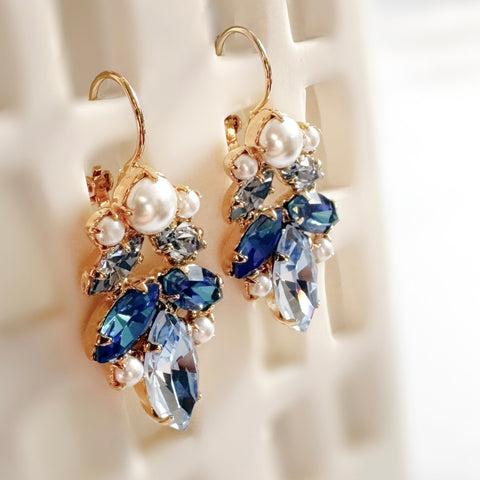 Green earrings with shiny crystals