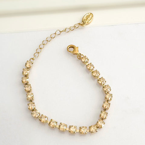 Gouden armbandje (smal) met gouden kristalletjes