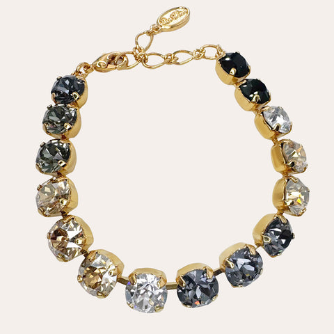 Gouden armbandje met zwarte kristallen