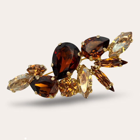 Broche met donkerbruine kristallen