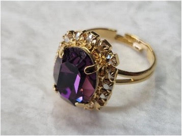 Green earrings with shiny crystals