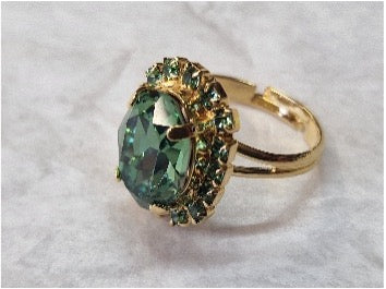 Green earrings with shiny crystals