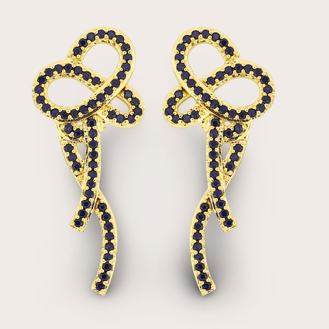 Strik oorstekertjes bezet met zwarte steentjes