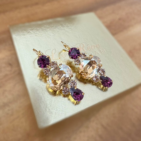 Oorbellen met paarse en gouden Swarovski-stenen
