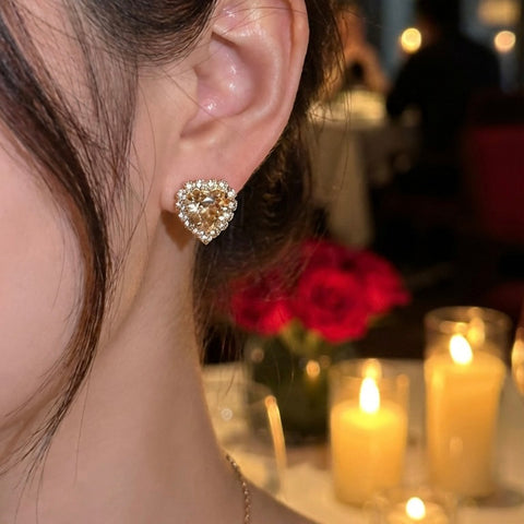 Gouden hartjes oorstekers met Swarovski kristallen