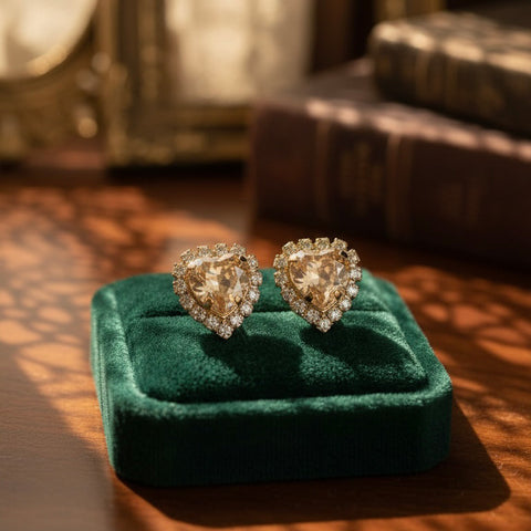 Gouden hartjes oorstekers met Swarovski kristallen