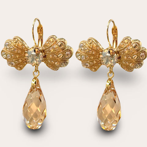 Gouden strik oorbellen met Swarovski druppel