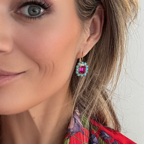 Green earrings with shiny crystals