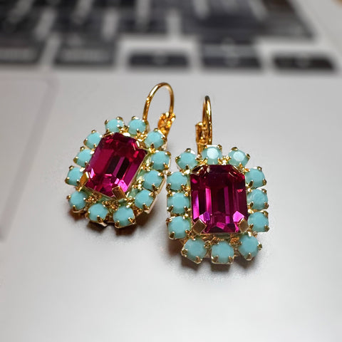 Green earrings with shiny crystals