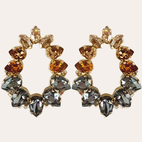 Stud earrings with soft blue crystals and a pearl