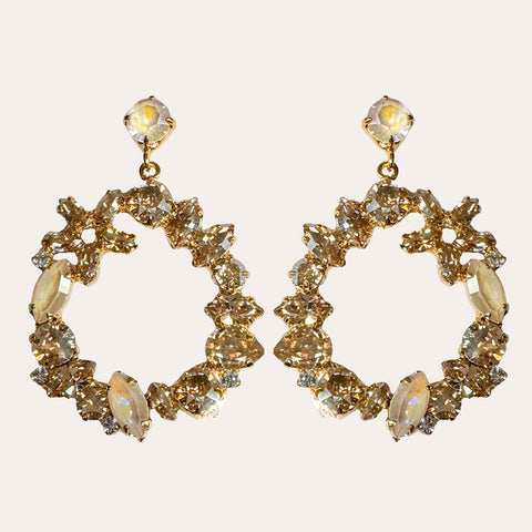 Oorstekers met ronde gouden/beige hanger