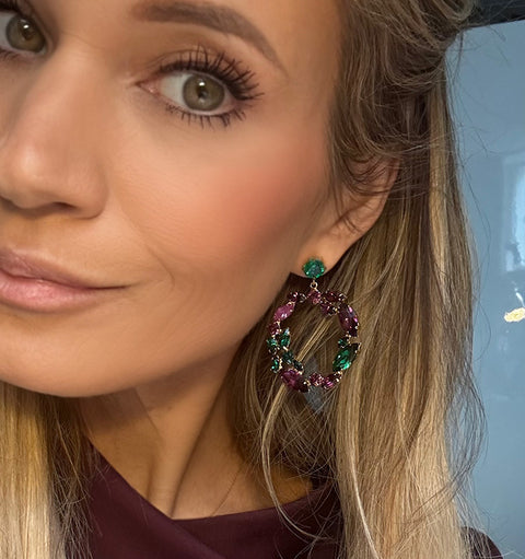 Stud earrings with soft blue crystals and a pearl