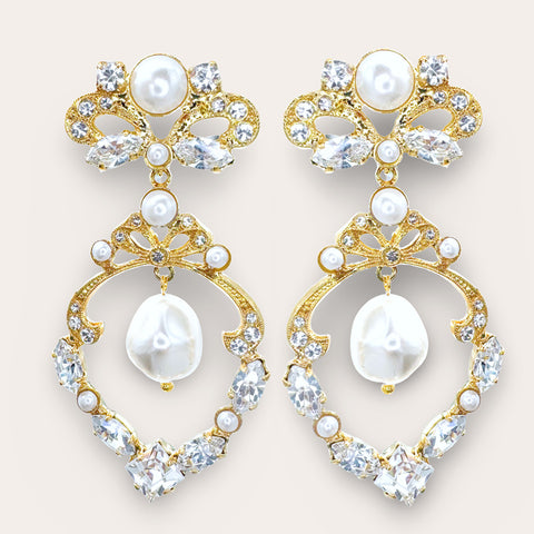 Charmante Statement-oorbellen met strikje en parels