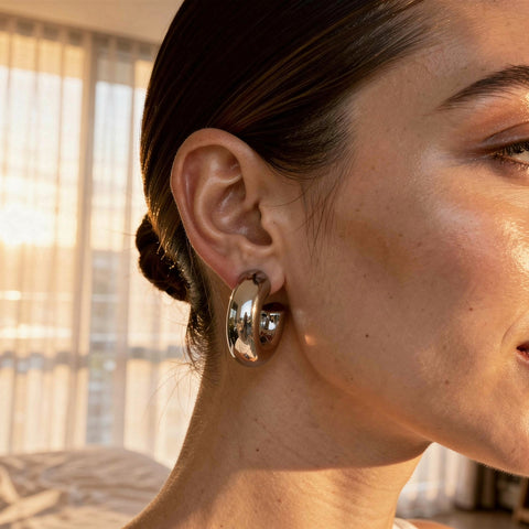 Charmante brede zilveren oorringen