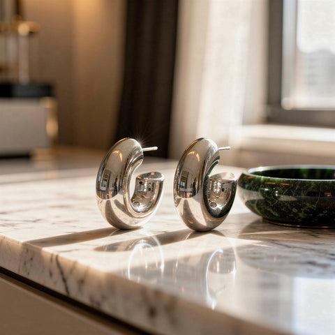 Charmante brede zilveren oorringen