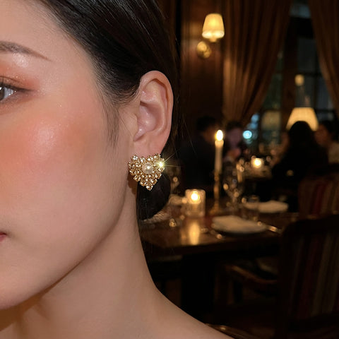 Luxe gouden oorbellen met hartje, parel & Swarovski kristallen