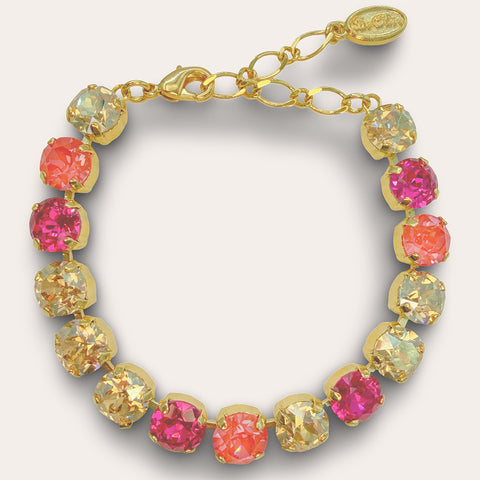 Gold bracelet with pink/orange Swarovski crystals