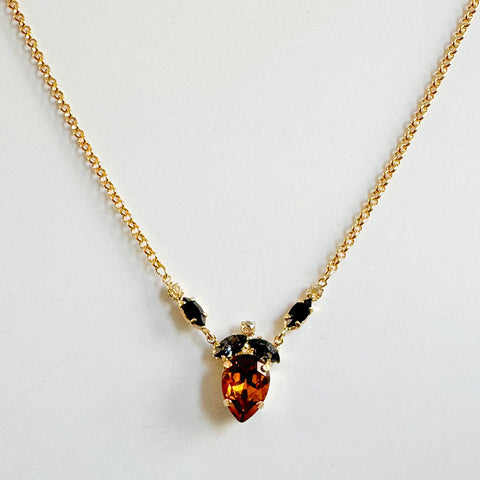 Gouden kettinkje met leopard hangertje