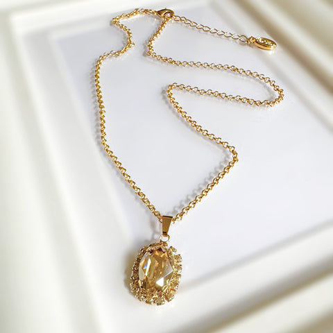 Gouden kettinkje met gouden hanger