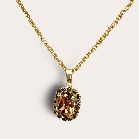 Gouden kettinkje met bruine hanger