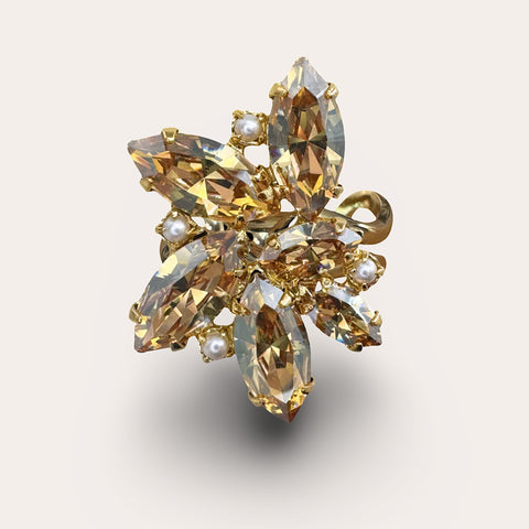 Ring with 10 brown crystals