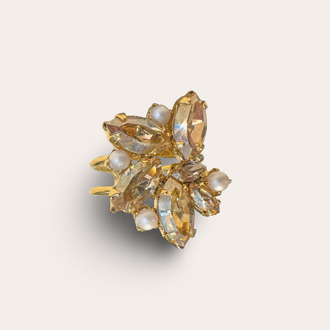 Ring with 10 brown crystals