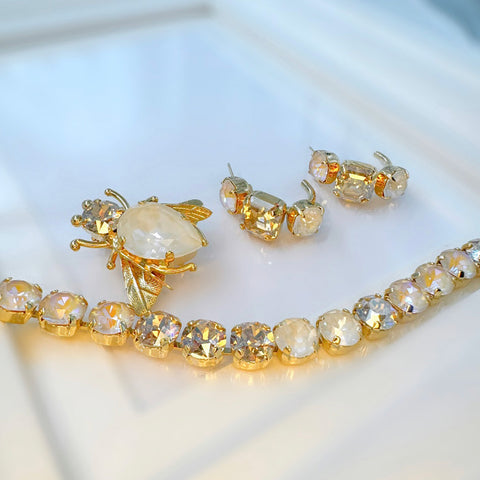 Creolen met beige en gouden kristallen