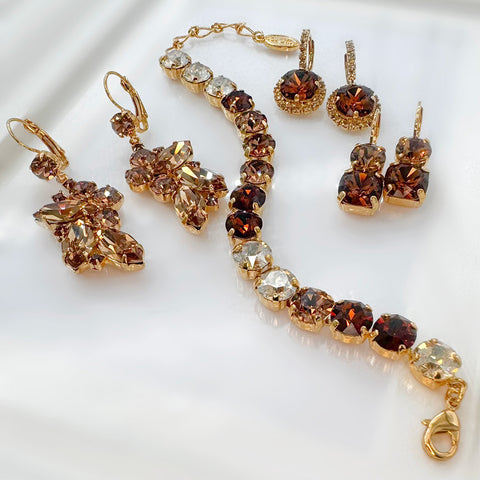 Earrings with golden and olive-green Swarovski stones